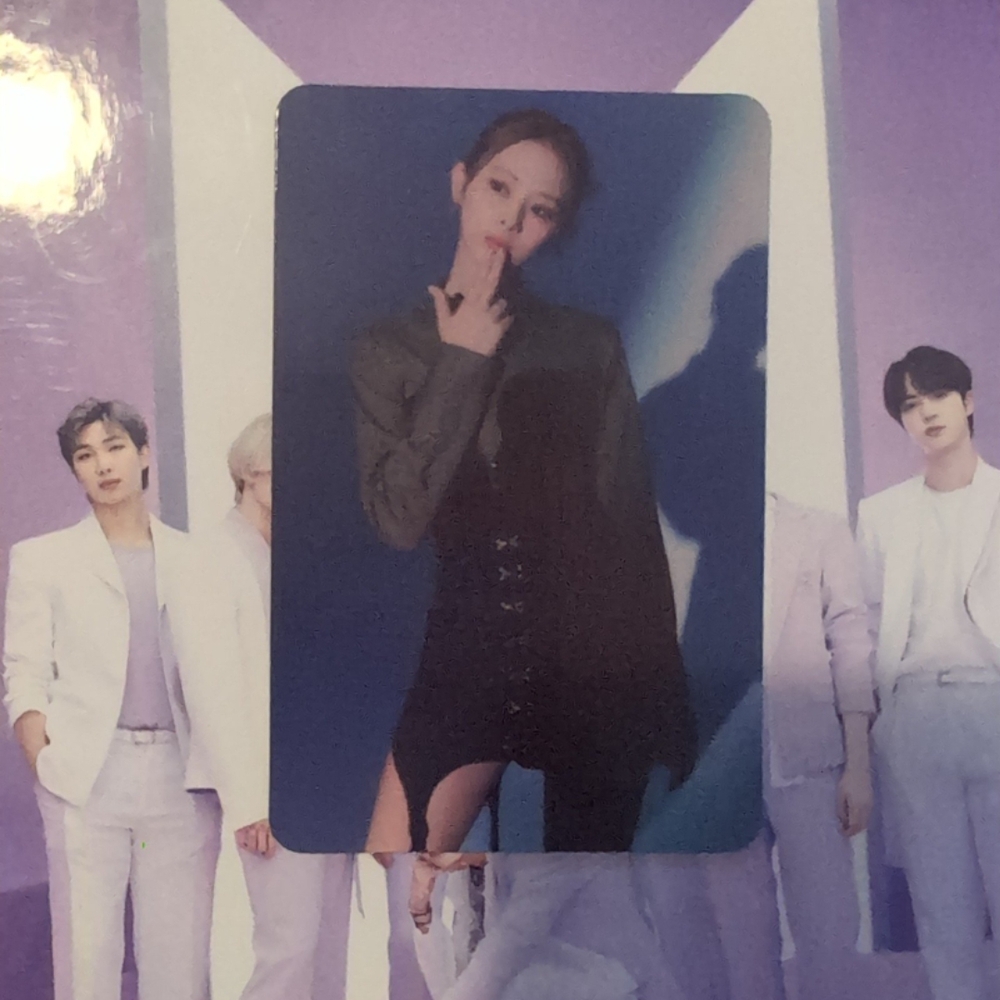K-Pop Photocard with Group Poster